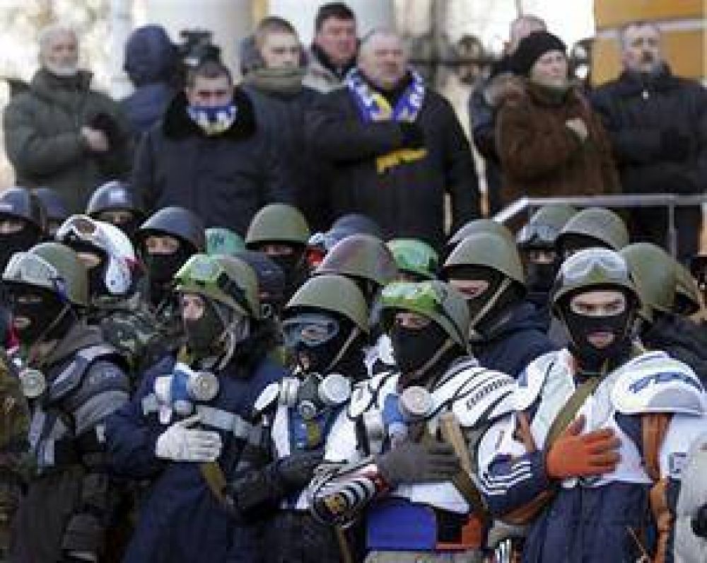 Advierten que la crisis pol�tica y la violencia empujan a Ucrania hacia una guerra civil