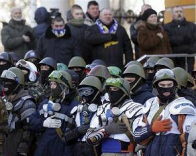 Advierten que la crisis pol�tica y la violencia empujan a Ucrania hacia una guerra civil