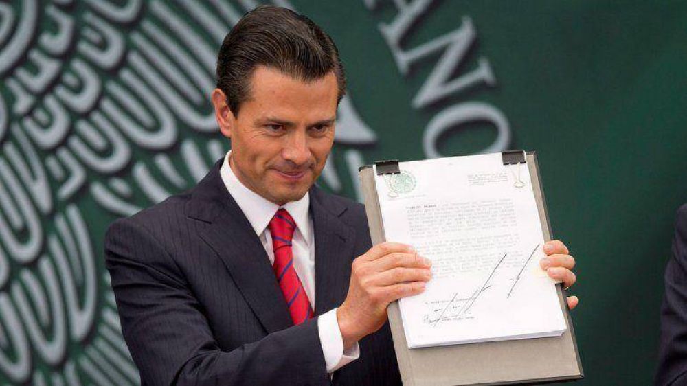 M�xico: Pe�a Nieto promulg� la reforma pol�tica en medio de las manifestaciones de la izquierda