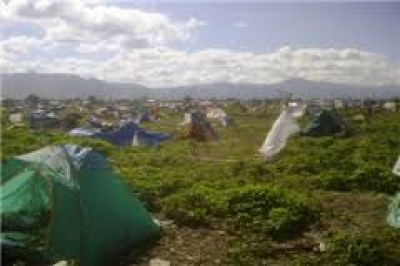  Familias que se hab�an asentado en zona sur marcharon por las calles c�ntricas