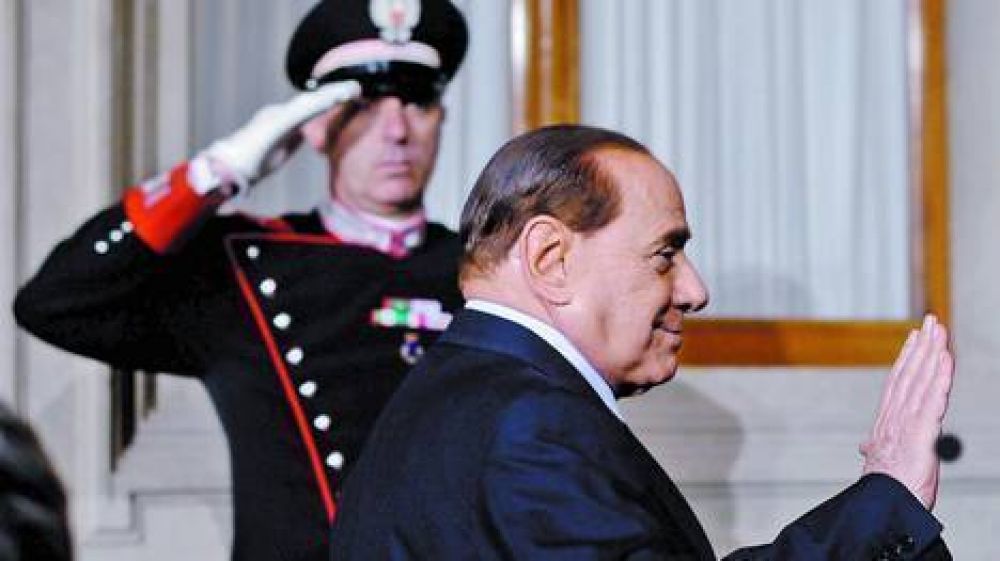 Berlusconi se reuni con el presidente y le dio un guio al futuro premier