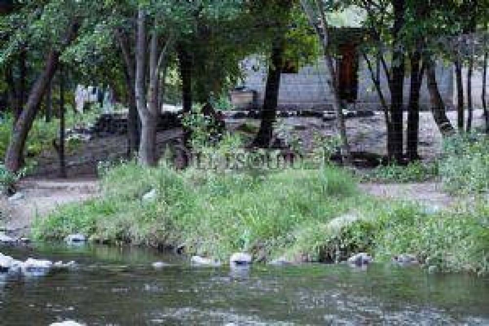 Buscan el desalojo judicial de la ribera del r�o El Tala