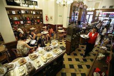 Proponen al h�bito porte�o del caf� como patrimonio de la humanidad