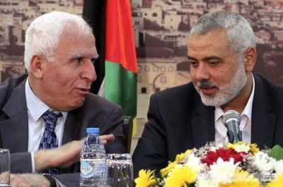Palestinos acuerdan reconciliarse, tras siete a�os de divisi�n
