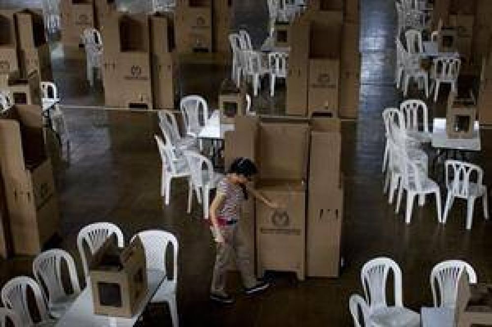 Santos y Zuluaga llegan sin ventajas, en unas elecciones marcadas por el di�logo de paz