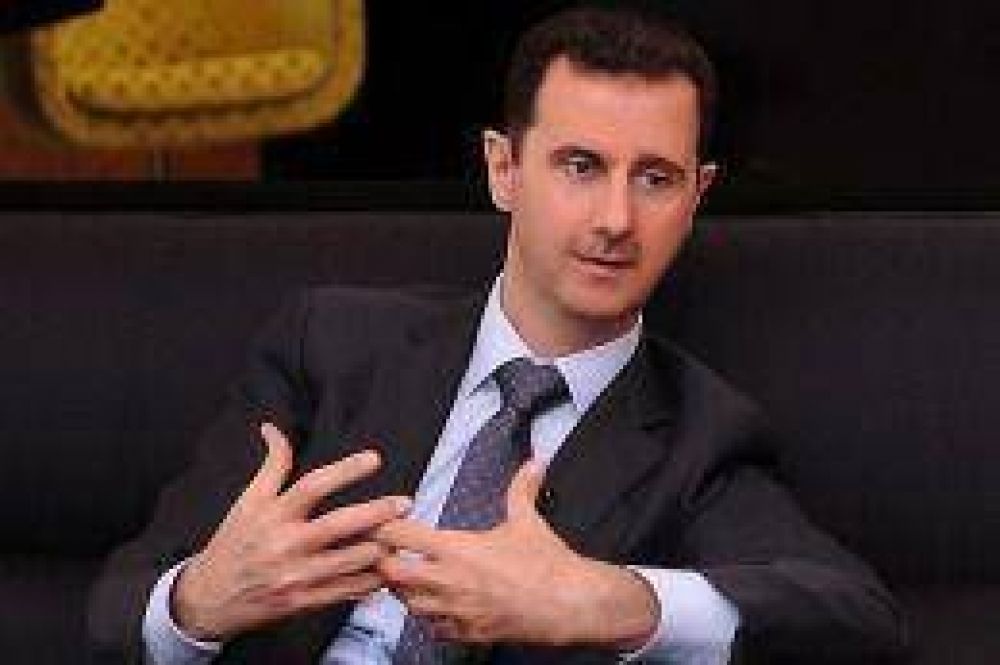 En medio del sangriento conflicto, Al Assad va en busca de su reelecci�n