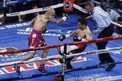 Maravilla Mart�nez, una derrota con sabor a final: fue castigado duramente por Miguel Cotto y perdi� por KOT