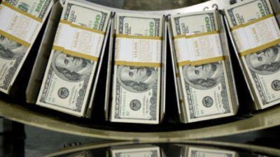 El d�lar blue baja a $ 12,06 en una rueda acotada por el partido