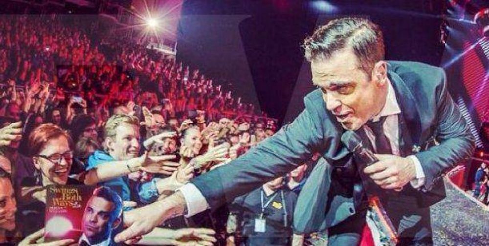Robbie Williams le quebr� el brazo a una fan�tica en un recital