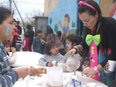 La sonrisa de los ni�os en el Comedor Caritas Sucias