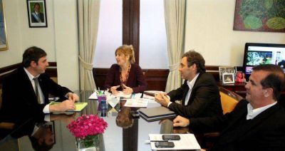 Notta y Luciani juntos en una reuni�n en Provincia