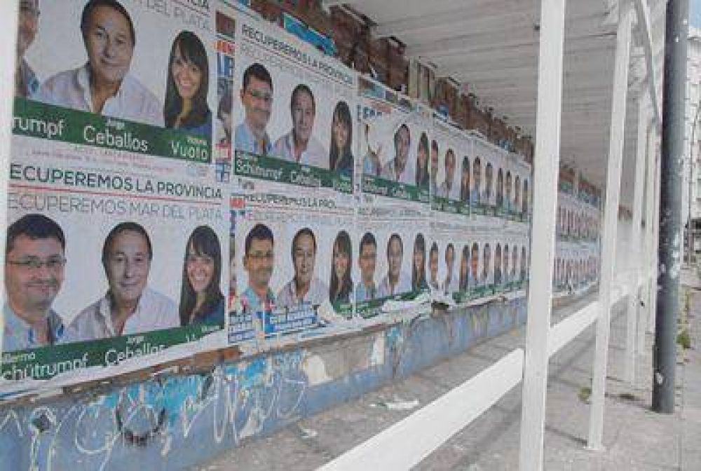 Los pol�ticos aparecen con afiches y pintadas aunque la Ley no lo permite