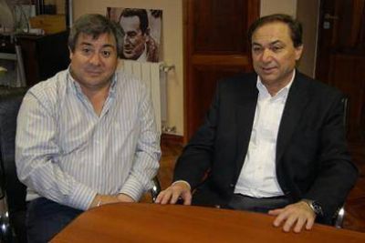 Con el retrato de Per�n de fondo