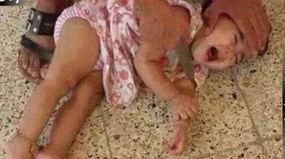 Estado Isl�mico fotograf�a a un beb� a punto de ser decapitado en Kobane