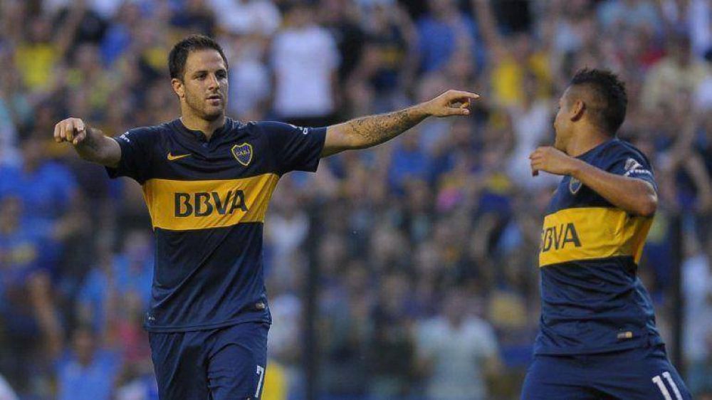 Boca, por un eficaz 'Burrito', le gan� como local a Defensa pero sigue a ocho de River