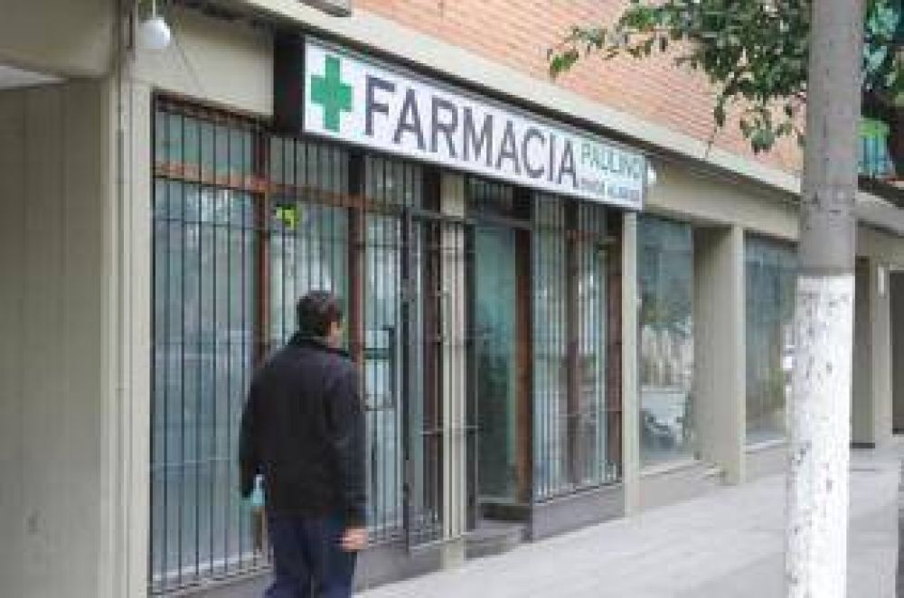 En Barrio Sur los comerciantes atienden tras las rejas a causa de los asaltos