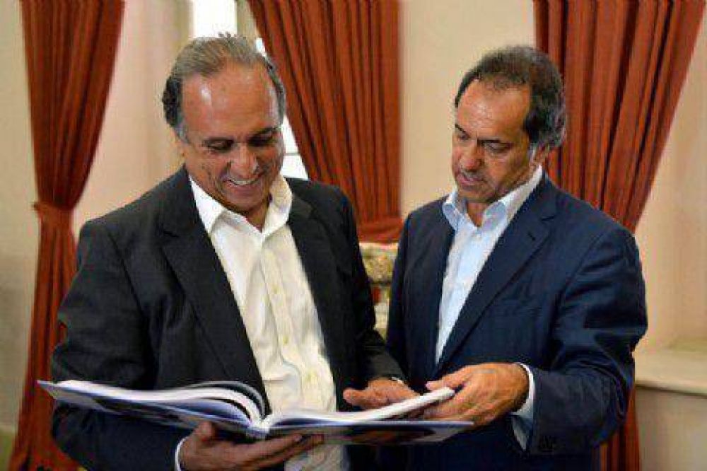 Scioli se reuni� con el gobernador de R�o y recorri� el Banco de Desarrollo 