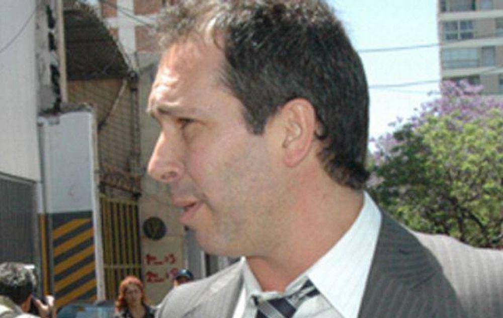 Cossar tild� de 