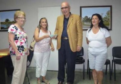 Aporte de Walter Abarca, Alejandro Armend�riz, Ricardo Lissalde y Marcelo Sa�n al Hogar de Ancianos