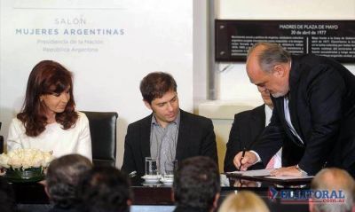 Colombi firma refinanciaci�n de pasivos y reclama a Naci�n �soluci�n de fondo�