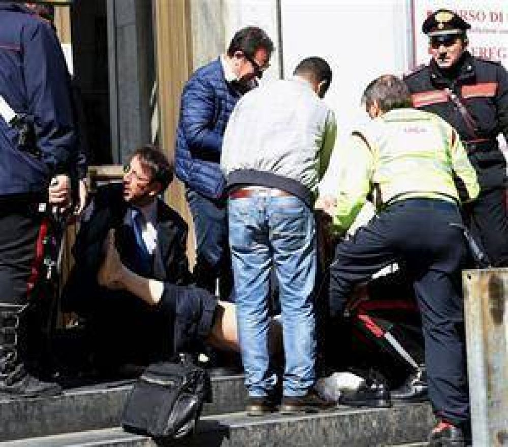 D�a de furia en Mil�n: tres muertos en los tribunales