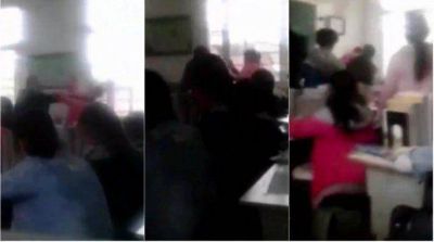 Un maestro fue suspendido tras golpear y empujar a una alumna en China