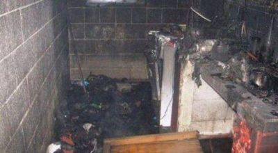 Dos heridos al incendiarse una casa del barrio Espa�a