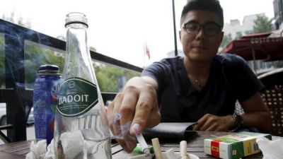 China: el reino del tabaco proh�be fumar