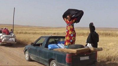 La emoci�n de las mujeres que se liberan del Estado Isl�mico y se quitan la burka en Siria