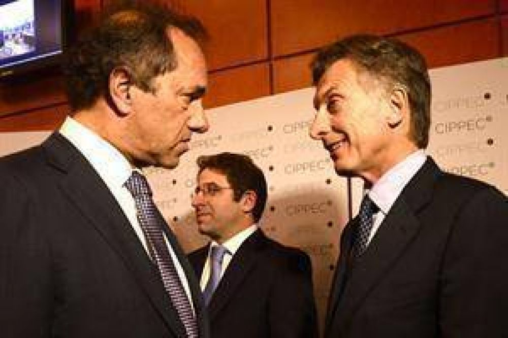 Como anticipo de las PASO, Scioli y Macri buscaron polarizar los resultados del 5-J