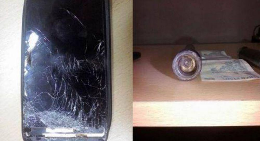 Polic�a fue atacado a tiros en un procedimiento y su celular lo salv�