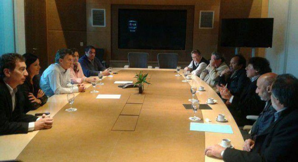 Macri le prometi� a Micheli que eliminar� el impuesto a las ganancias para los trabajadores