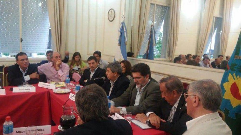 A la espera de una reuni�n clave, Lunghi particip� de un encuentro con Vidal