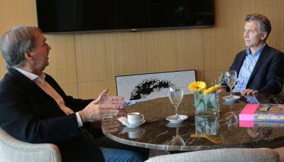 Deuda, finanzas, obras y seguridad, en el temario de Macri y Schiaretti