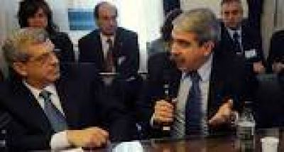 An�bal Fern�ndez y Juli�n Dom�nguez agitaron la interna con otro fuerte cruce