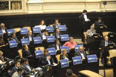 Diputados aprob� el l�mite a las �re-re�