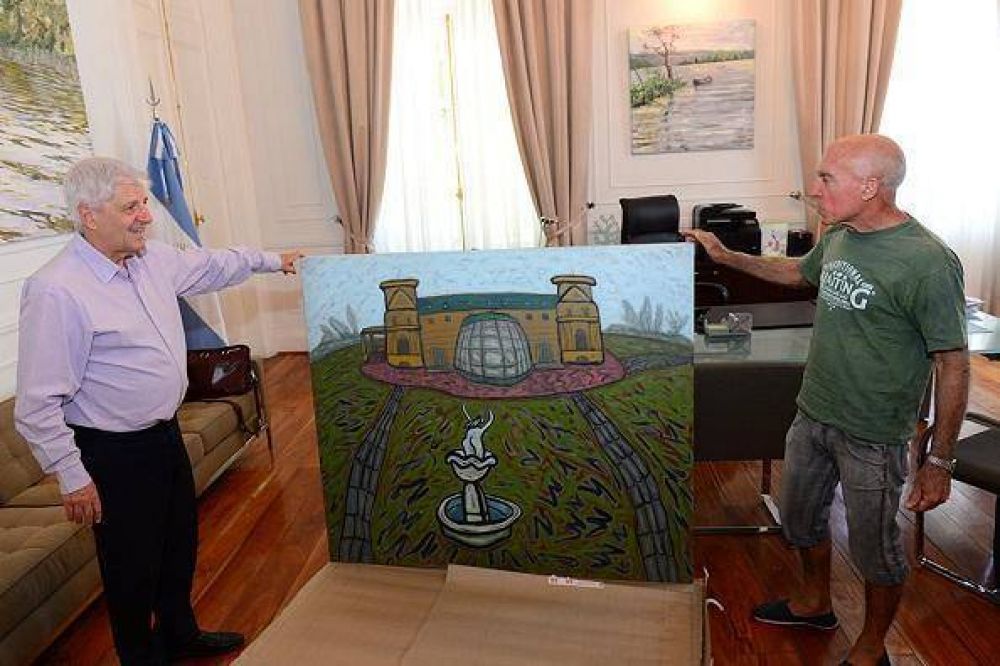 El artista Burone Risso le regal un cuadro al intendente Andreotti