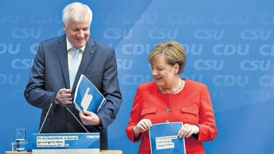 Promesas de Merkel y compa��a