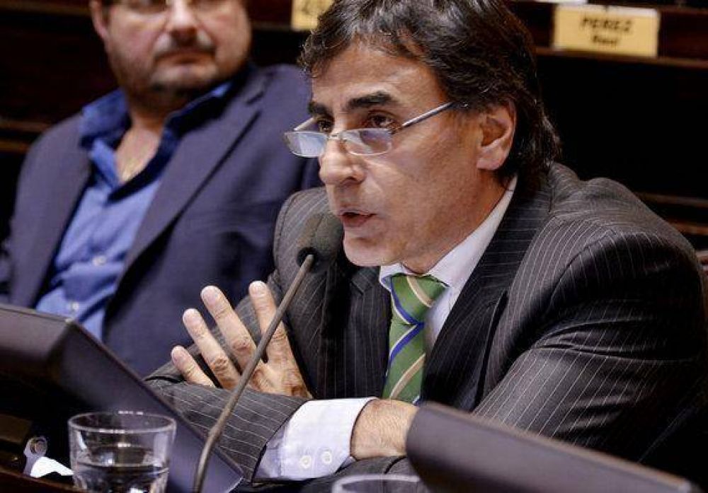 Rub�n Eslaiman: �Si alguno no est� c�modo que se vaya ahora�