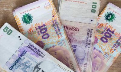 En medio de la pol�mica, algunos expendedores comenzaron a pagar el Bono de fin de a�o