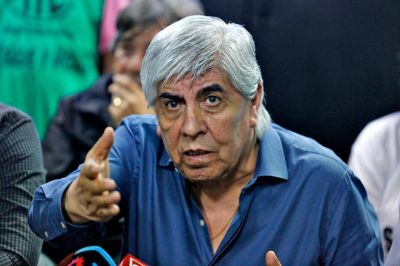 Moyano negocia un plus empresa por empresa