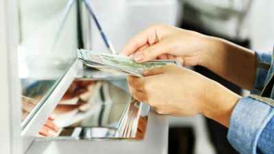 Bancarios acuerdan un aumento de 19,5% m�s un bono de $12.500
