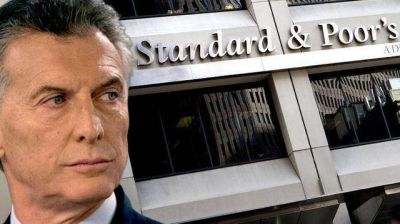 Default por un d�a: la calificadora de riesgo S&P le baj� la nota a la Argentina pero avis� que la subir�