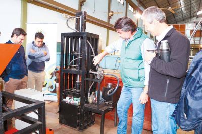Epet de Ober� dise�� m�quina para compactar residuos