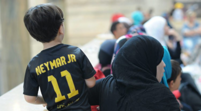Cristianos y jud�os acogen en conjunto a una familia de refugiados