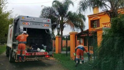 Desinfecci�n en las calles y recolecci�n de basura, normal