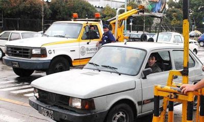 Ante el aumento de autos mal estacionados, el Gobierno porte�o restablecer� gradualmente el servicio de gr�as