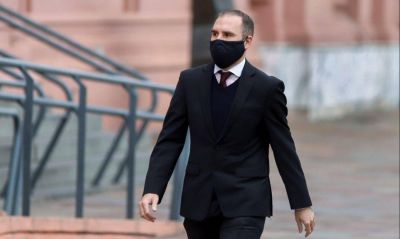 Guzm�n busca calmar al d�lar con la foto final de la deuda, pero el mercado duda