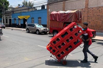 Embotelladora de Coca Cola reporta p�rdidas de 56% en tercer trimestre