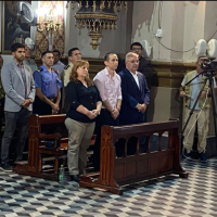 Nahuel Gallo y Ra�l Jalil, en una misa de agradecimiento por el feliz regreso